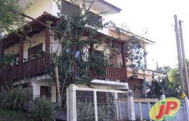 Imagem: A casa em condomínio possui 3 Dormitórios, 2 Banheiros, 4