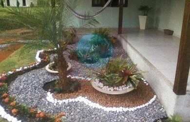 Imagem: A casa possui 3 Dormitórios, 2 Banheiros, 2 Vagas na garagem