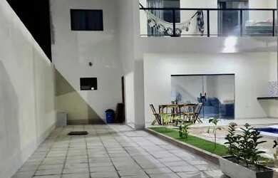 Imagem: A casa possui 3 Dormitórios, 5 Banheiros, 3 Vagas na garagem