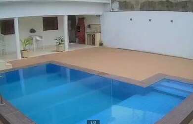 Imagem: A casa possui 3 Dormitórios, 4 Vagas na garagem e está localizado