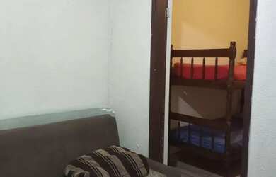 Imagem: A casa possui 3 Dormitórios, 3 Vagas na garagem e está localizado