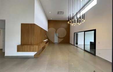 Imagem: A casa em condomínio à venda possui 4 Dormitórios, 5 Banheiros