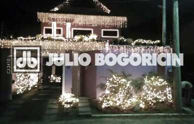 Imagem: A casa em condomínio possui 5 Dormitórios, 5 Banheiros, 4