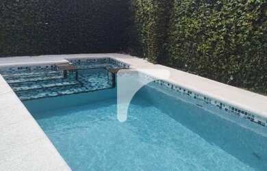 Imagem: A casa em condomínio possui 3 Dormitórios, 5 Banheiros, 4