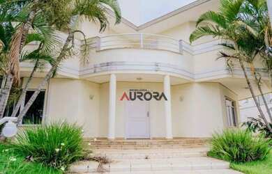 Imagem: A casa possui 4 Dormitórios, 5 Banheiros, 5 Vagas na garagem