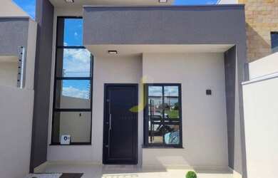 Imagem: A casa possui 3 Dormitórios, 2 Banheiros, 2 Vagas na garagem