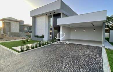 Imagem: A casa em condomínio possui 4 Dormitórios, 5 Banheiros, 244m²