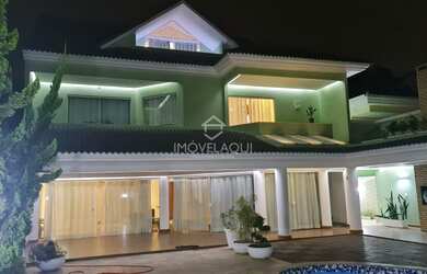 Imagem: A casa em condomínio possui 5 Dormitórios, 5 Banheiros, 5