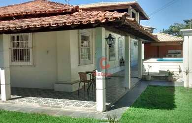 Imagem: A casa possui 5 Dormitórios, 5 Banheiros, 5 Vagas na garagem