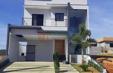 Imagem: A casa possui 3 Dormitórios, 5 Banheiros, 4 Vagas na garagem