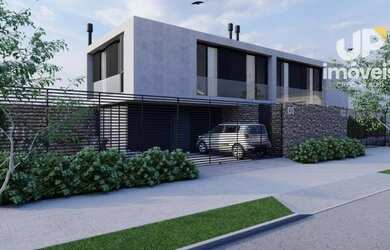 Imagem: A casa possui 3 Dormitórios, 2 Banheiros, 2 Vagas na garagem