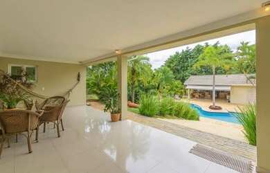 Imagem: A casa possui 5 Dormitórios, 3 Banheiros, 5 Vagas na garagem