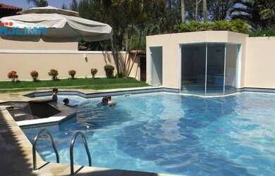 Imagem: A casa em condomínio possui 4 Dormitórios, 5 Banheiros, 5