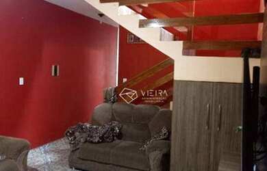 Imagem: A casa possui 3 Dormitórios, 2 Banheiros, 2 Vagas na garagem