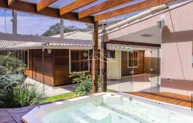 Imagem: A casa em condomínio possui 3 Dormitórios, 3 Banheiros, 4