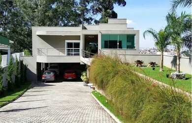 Imagem: A casa em condomínio possui 5 Dormitórios, 5 Banheiros, 5