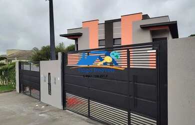 Imagem: A casa possui 3 Dormitórios, 4 Banheiros, 2 Vagas na garagem