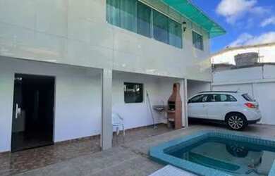 Imagem: A casa possui 4 Dormitórios, 5 Banheiros, 3 Vagas na garagem