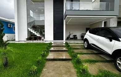 Imagem: A casa em condomínio possui 5 Dormitórios, 5 Banheiros, 4