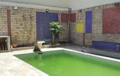 Imagem: A casa possui 4 Dormitórios, 5 Banheiros, 5 Vagas na garagem