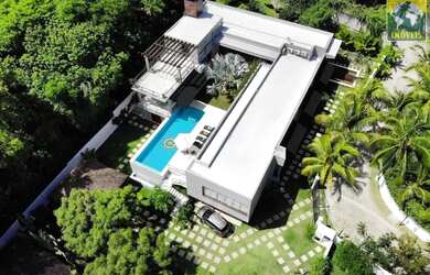 Imagem: A casa possui 4 Dormitórios, 5 Banheiros, 5 Vagas na garagem