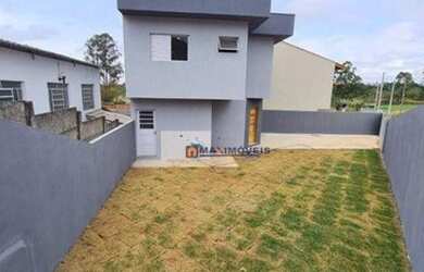 Imagem: A casa possui 2 Dormitórios, 3 Banheiros, 3 Vagas na garagem