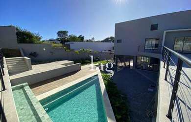 Imagem: A casa em condomínio à venda possui 4 Dormitórios, 5 Banheiros