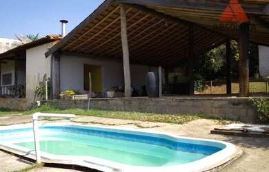 Imagem 1: Excelente chácara com 02 casas no asfalto na Praia dos Namorados