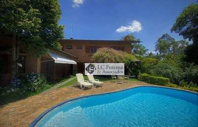 Imagem: A casa em condomínio possui 4 Dormitórios, 5 Banheiros, 5