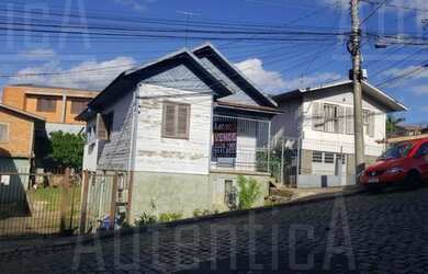 Imagem: A casa possui 3 Dormitórios, 2 Banheiros, 20m² de Área e