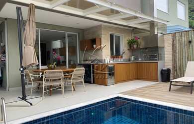 Imagem 1: Casa em condomínio contendo 3 suítes, piscina privativa, situado na praia de Juquehy