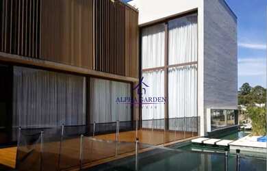 Imagem: A casa em condomínio possui 5 Dormitórios, 5 Banheiros, 4