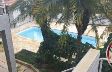 Imagem: A casa possui 3 Dormitórios, 4 Banheiros, 3 Vagas na garagem