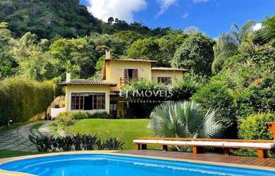 Imagem: A casa em condomínio à venda possui 5 Dormitórios, 4 Banheiros