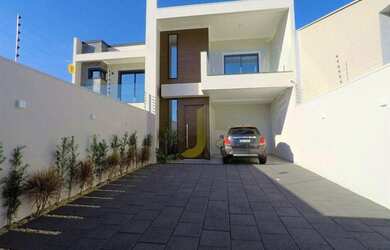 Imagem: A casa possui 3 Dormitórios, 1 Banheiro, 3 Vagas na garagem