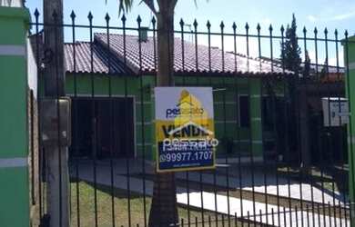 Imagem: A casa possui 3 Dormitórios, 2 Banheiros, 3 Vagas na garagem