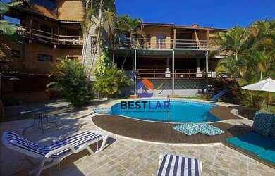 Imagem: A casa em condomínio possui 4 Dormitórios, 5 Banheiros, 5