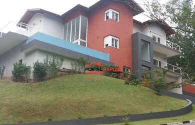 Imagem: A casa em condomínio possui 5 Dormitórios, 4 Banheiros, 5