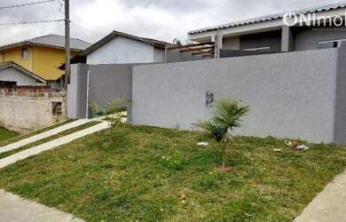 Imagem: A casa possui 3 Dormitórios, 1 Banheiro, 2 Vagas na garagem