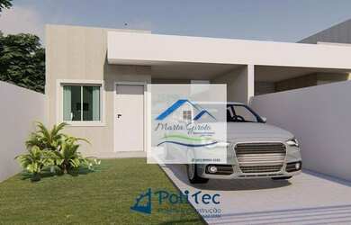 Imagem: A casa possui 3 Dormitórios, 2 Banheiros, 2 Vagas na garagem