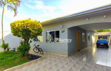 Imagem: A casa possui 3 Dormitórios, 3 Banheiros, 3 Vagas na garagem