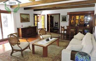 Imagem: A casa possui 4 Dormitórios, 5 Banheiros, 5 Vagas na garagem