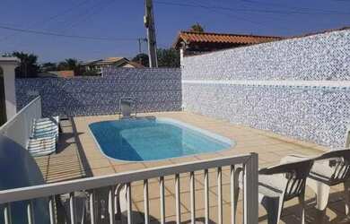 Imagem: A casa possui 3 Dormitórios, 2 Banheiros, 5 Vagas na garagem