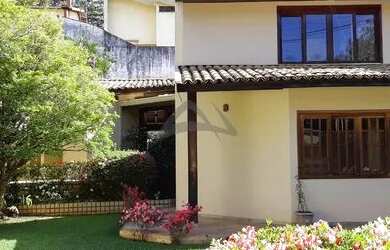 Imagem: A casa possui 3 Dormitórios, 5 Banheiros, 5 Vagas na garagem