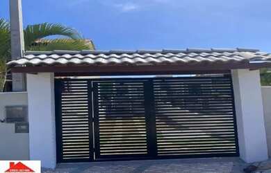 Imagem: A casa possui 3 Dormitórios, 4 Banheiros, 4 Vagas na garagem