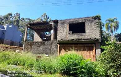 Imagem: A casa em condomínio possui 5 Dormitórios e está localizado