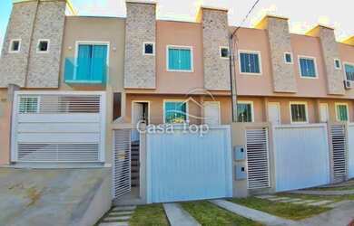 Imagem: A casa possui 3 Dormitórios, 3 Banheiros, 2 Vagas na garagem