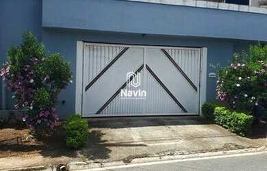 Imagem: A casa possui 4 Dormitórios, 2 Banheiros, 2 Vagas na garagem