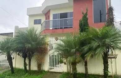 Imagem: A casa possui 4 Dormitórios, 3 Banheiros, 3 Vagas na garagem