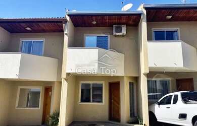 Imagem: A casa possui 2 Dormitórios, 1 Banheiro, 1 Vaga na garagem